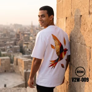 DEDO V2W-009 white oversized t-shirt with a colorful flying bird art print on the back.