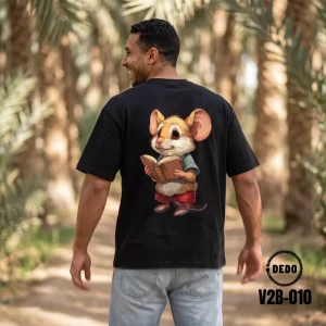 DEDO V2B-010 black oversized t-shirt with reading mouse back graphic in a palm grove outdoor setting