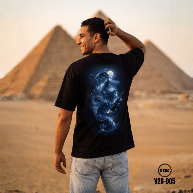 DEDO V2B-005 black oversized T-shirt with blue dragon back graphic in front of the Pyramids of Giza