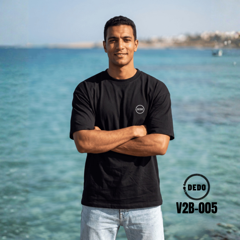 DEDO V2B-005 black oversized T-shirt with DEDO logo on the chest by the sea